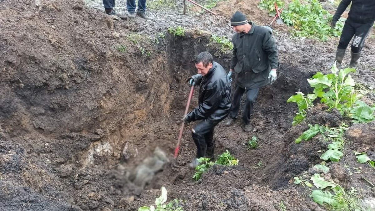 В Харьковской области обнаружено массовое захоронение