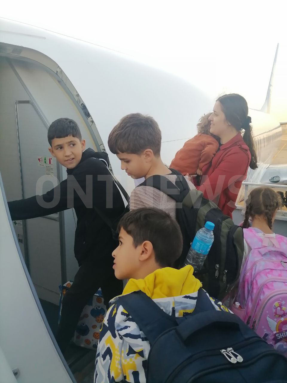 Эвакуированные из сектора Газа вылетают в Минск - фотофакт