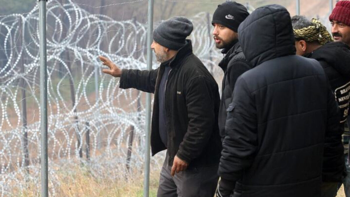 Мигранты на беларусско-польской границе, 2021 год. Фото: Reuters