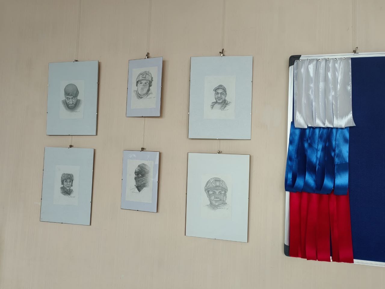 Портреты военных преступников к очередной годовщине начала "СВО" выставил "Русский дом в Бресте"